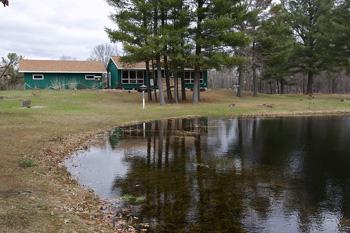 Almost 20 Acres of Vacant Wooded Land With Home & Pond!